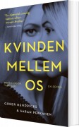 Kvinden Mellem Os