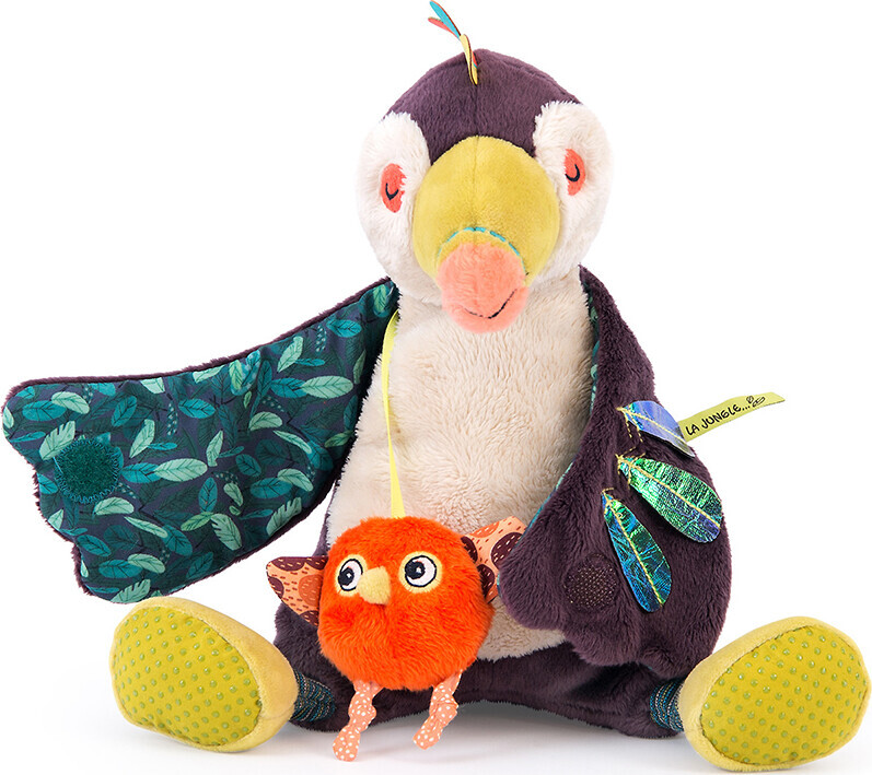 Moulin Roty - Tukanen Pakou Bamse Med Musik - 21 Cm