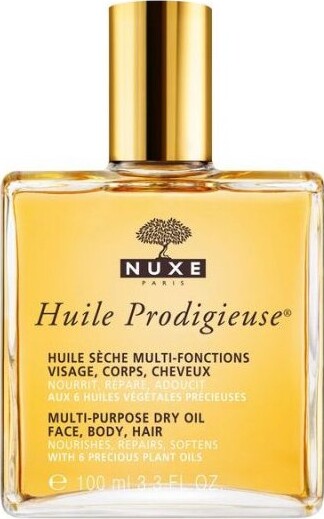 Nuxe Prodigieuse Dry Oil 100 ml er en luksuriøs multitasking olie, der forvandler huden og håret med en silkeblød finish og intens fugt. Den unikke sammensætning af ingredienser nærer dybt og giver en sund glød året rundt. Brug olien som en daglig fugtighedscreme, en leave-in conditioner eller som en finisher for et poleret look. Velegnet til alle hudtyper for en strålende og velplejet udstråling.

Hovedegenskaber og fordele:
1. Multitasking olie til hud og hår.
2. Intensivt fugtgivende.
3. Skaber en silkeblød finish.
4. Velegnet til daglig brug.
5. Nærer dybt og fremmer en sund glød.
6. Perfekt til alle hudtyper og årstider.