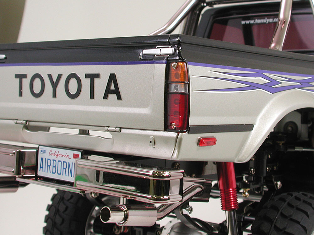 Tamiya - Rc Toyota Hilux High-Lift Fjernstyret Bil Byggesæt - 1 10 - 58397