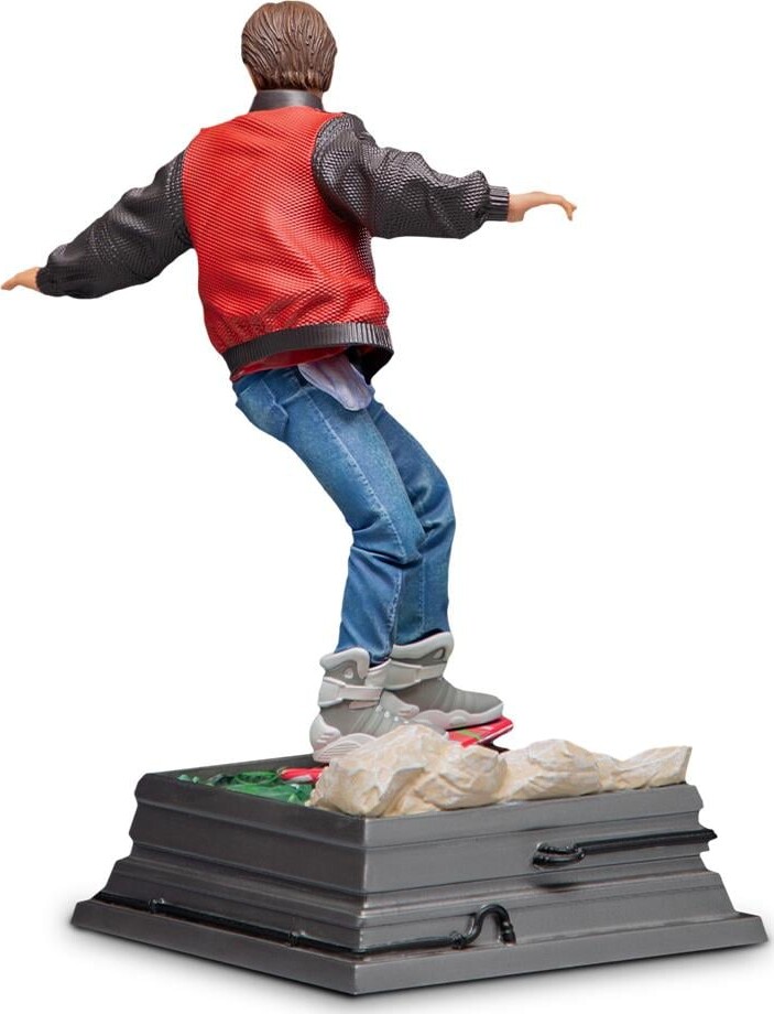 Skateboarder tumbles while copying Marty McFly's cling on to a car stunts in Back to the Future